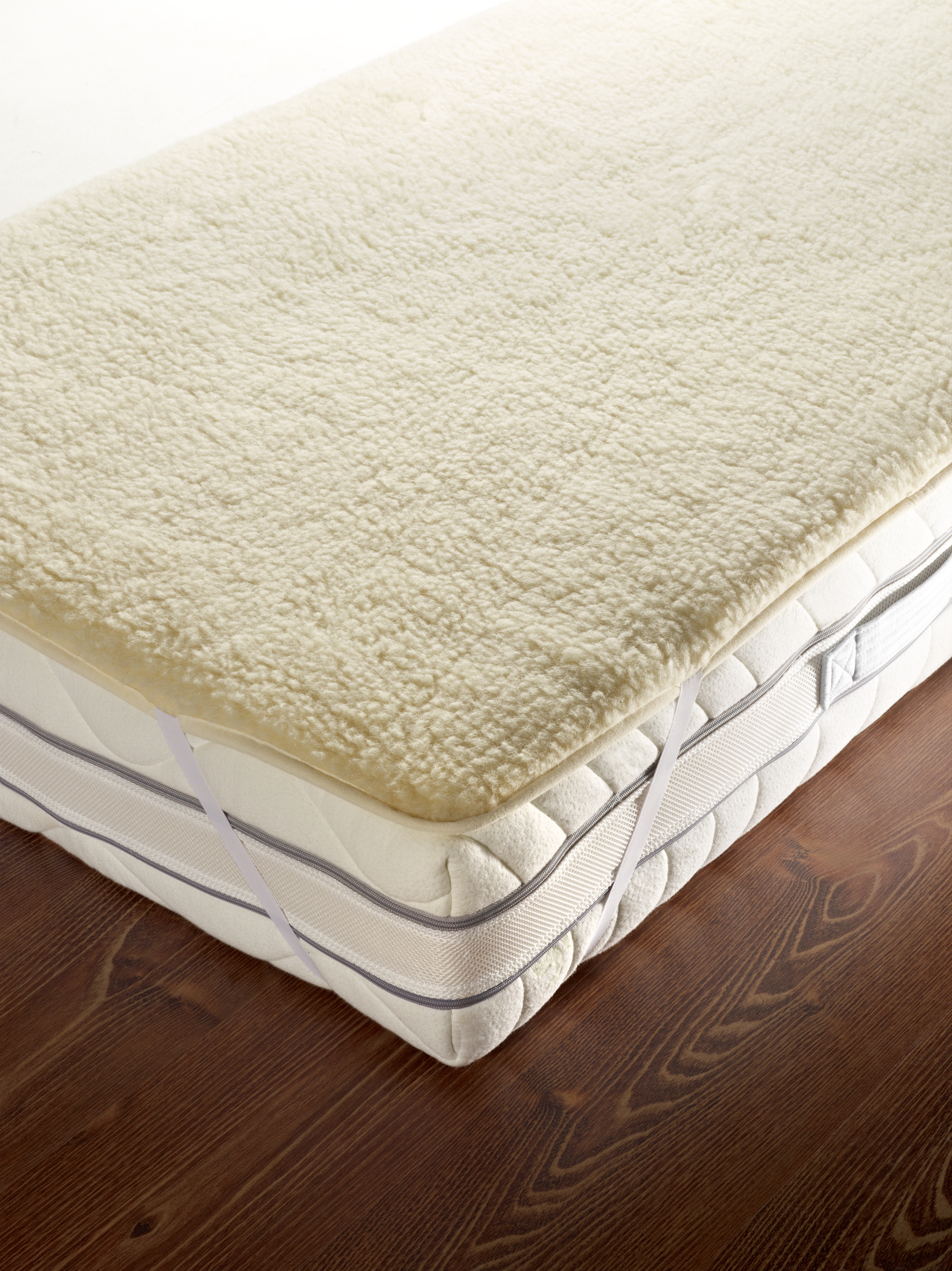 Schurwoll-Matratzenauflage